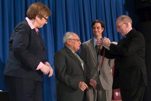 Gustavo Gutierrez receives Fordham's highest honor, the President's Medal, from Joseph M. McShane, SJ, president of FordhamPhotos by Leo Sorel