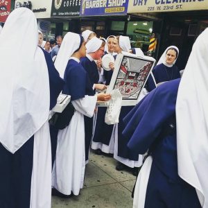 A group of Sisters of Life ordered a pizza after hours of waiting in line to enter Madison Square Garden for the Papal Mass. Photo by Joanna Mercuri