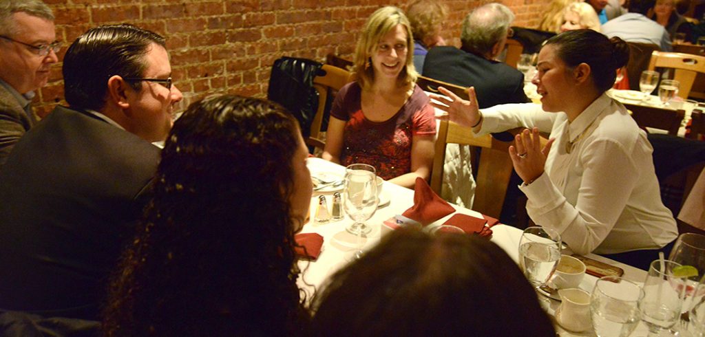 Vanessa Nadal, at right, joined fellow alumni for dinner and conversation. 