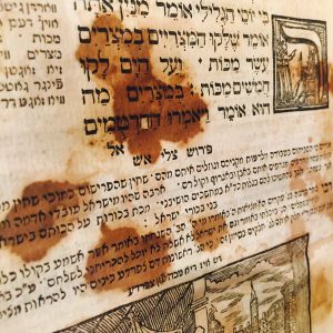Seder Haggadah in Yiddish and Hebrew from 1765, stained with wine from the ritual