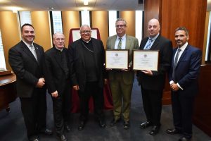 Thomas Kane and Christopher Signor, principals from the Diocese of Albany, were among those honored.