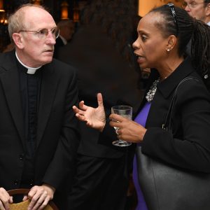 Father McShane with Anne Williams-Isom. 