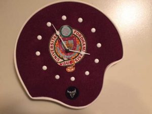 A football helmet clock in Pettenati's collection of Fordham memorabilia