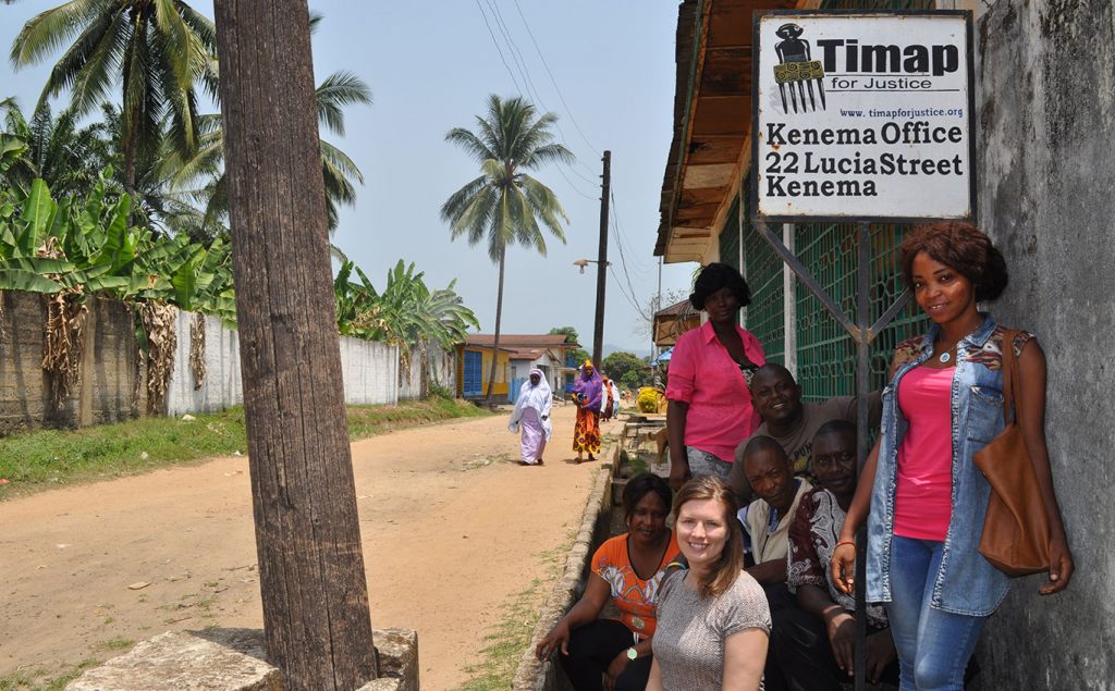 Frazier and members of Tmap at the organizations' office in Kenema, Sierra Leone.