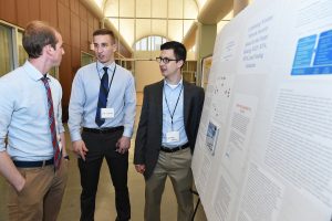 Computer science majors Luke Johnston and Chris Mallozzi present their research, "Combating Wireless Network Security Issues for the Future" at the 2017 Undergraduate Research Symposium. (Photo by Dana Maxson)