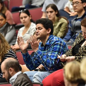 Student asks question at Higgins Clark lecture