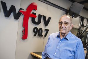 Bob Ahrens in the WFUV studios, where he oversaw the sports department for two decades. (Photo by Dana Maxson)