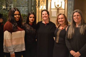 Fordham English professor Keri Walsh (center) with three of her students (from left), Chenelle Simpson, Zainab Shaikh, and Lauren Beglin, and Jean Hanff Korelitz, co-author of "The Dead, 1904," at the American Irish Historical Society.