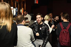 Some of the more than three dozen Fordham alumni who gathered at a Midtown Manhattan bar for the 2018 "Faith on Tap" lecture
