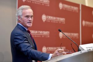 Scott Pelley addresses an audience at Fordham Law