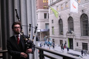 Fordham bagpipes over Wall Street.