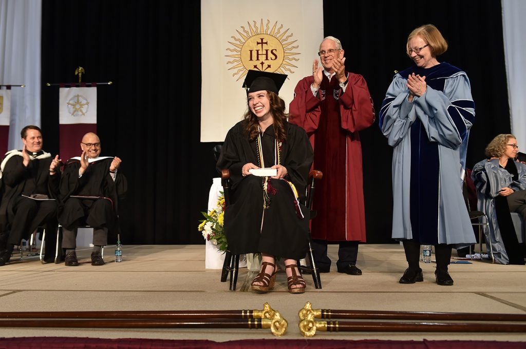 Erin Shanahan, who was awarded the Fordham College Alumni Association Award, Thomas Scirghi, SJ, and Maura Mast
