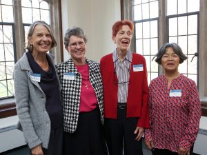 Four women standing together 