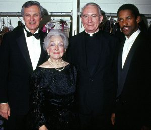 Father O'Hare at a formal Fordham event with Helen Hayes, Alan Alda, and Denzel Washington