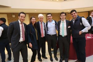 Mario Gabelli standing with students 