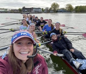 the varsity women's rowing team out on the water